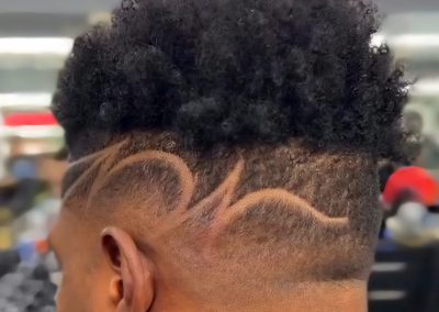 Burst Fade with Freestyle Hair Design and a Curly Sponge Top (Sunrise, Florida)